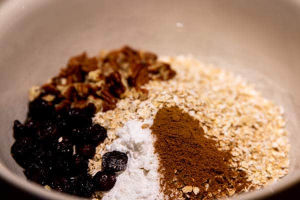 bowl with dry ingredients for pumpkin baked oatmeal