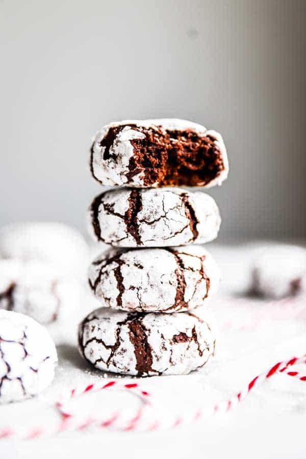 4 chocolate crinkle cookies in a stack