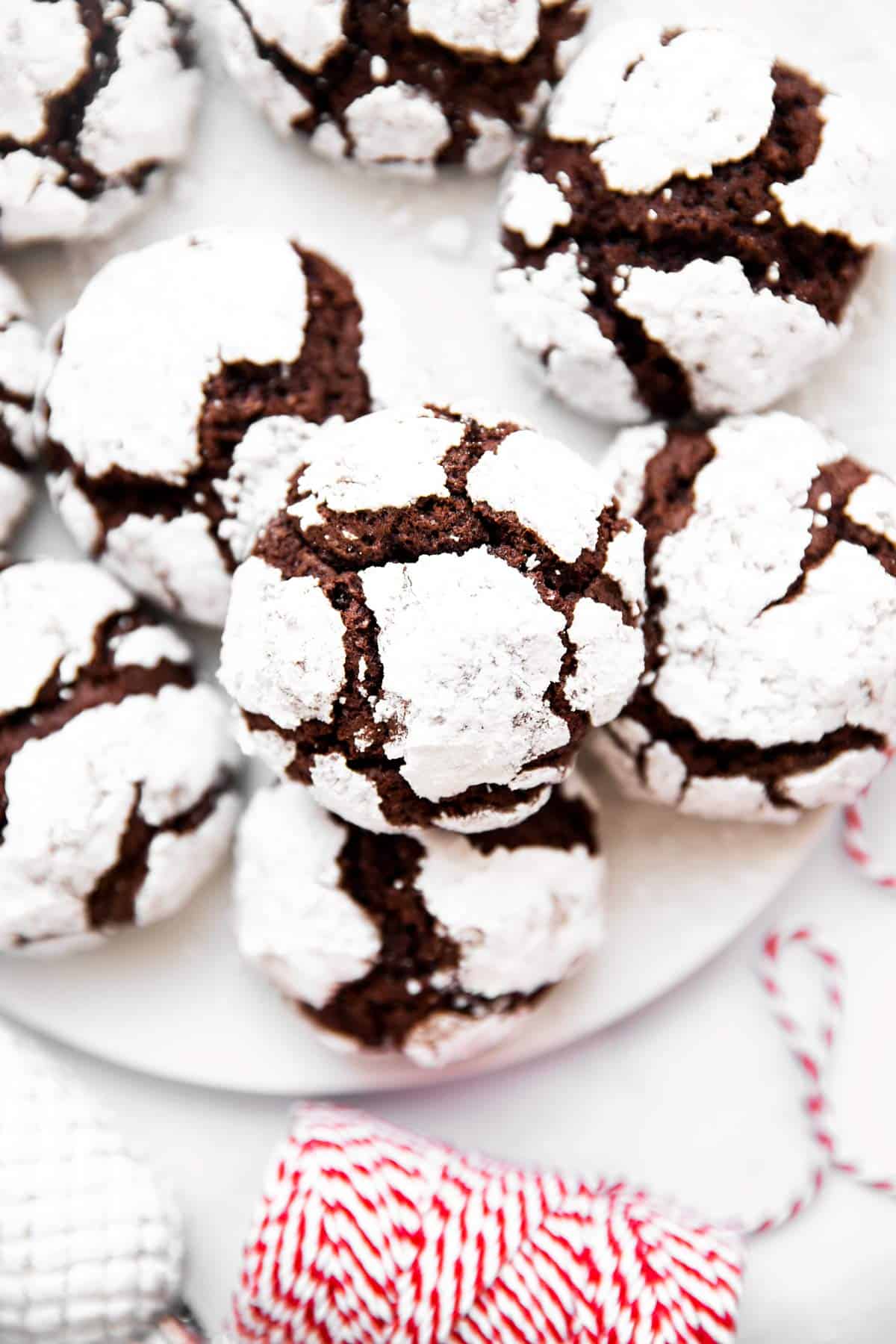 plate with several chocolate crinkle cookies