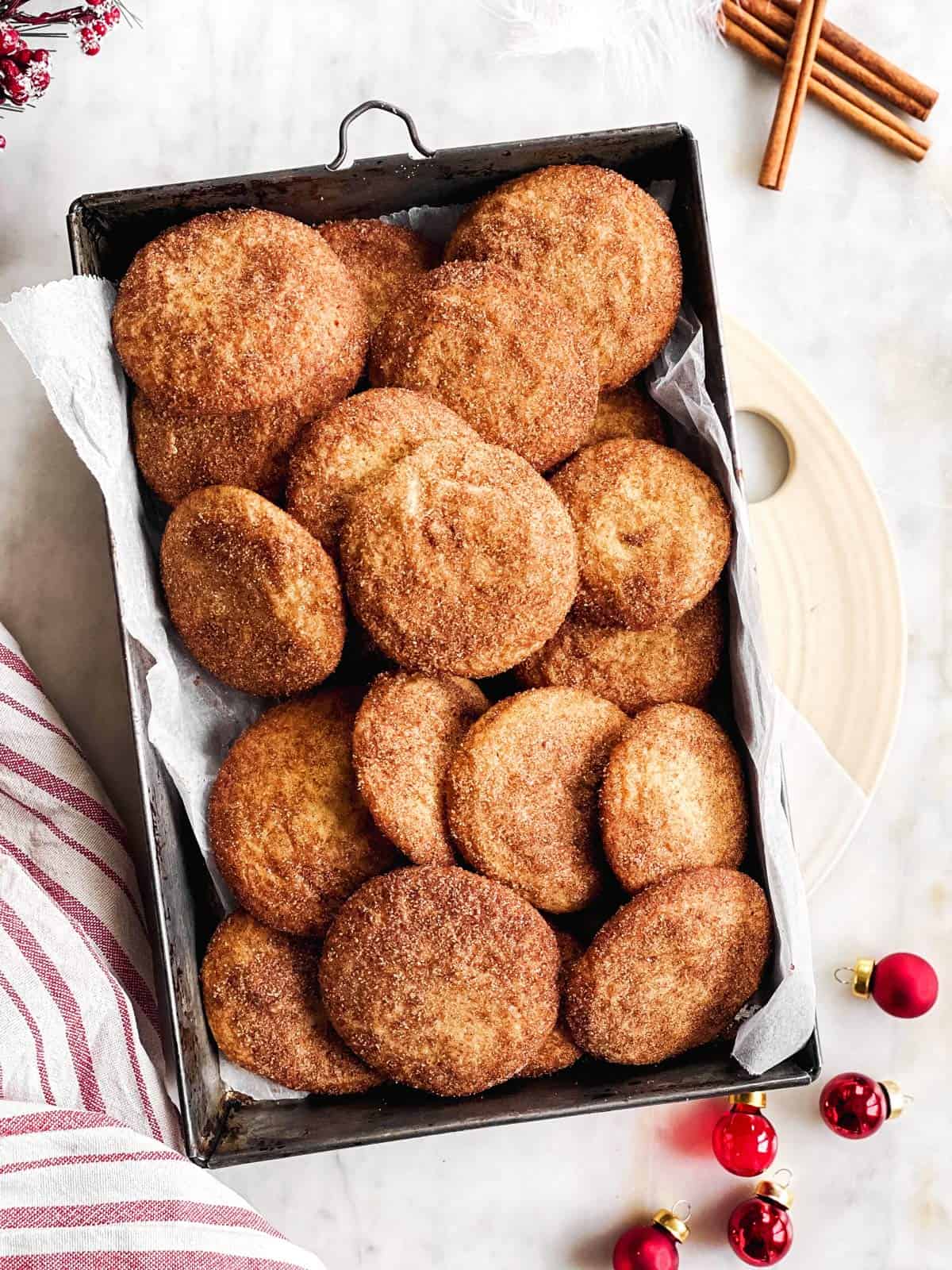 black metal pan filled with snickerdoodle cookies