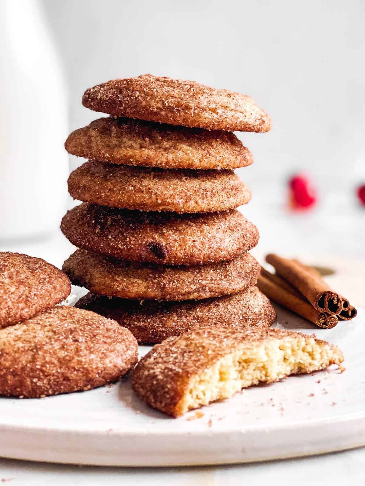 stack of snickerdoodle cookies on a white platter