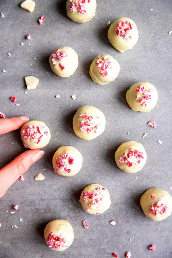 taking a peppermint oreo ball