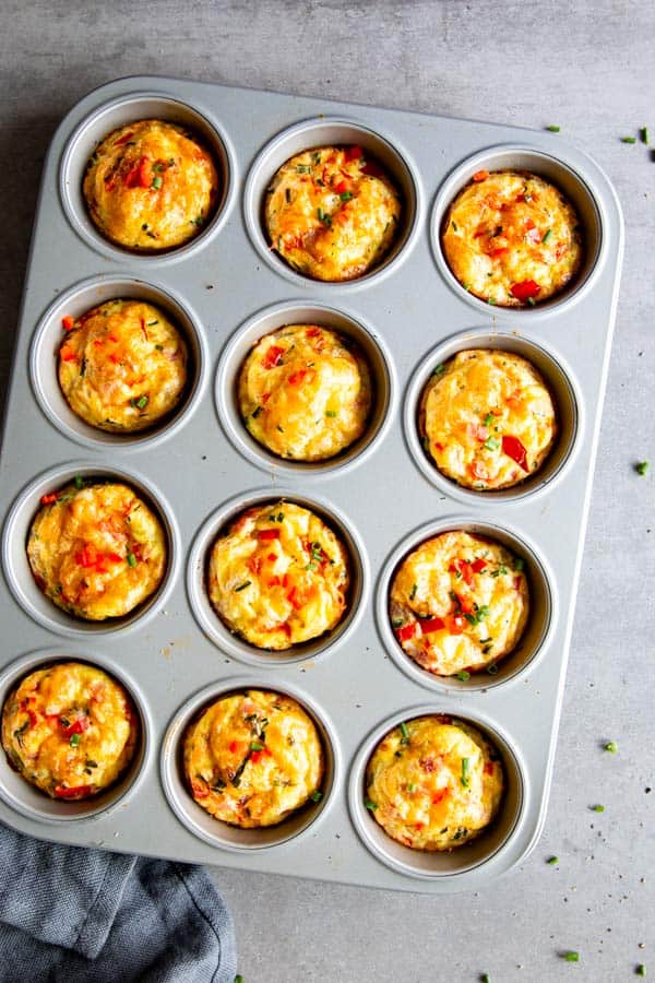 muffin pan with cheddar bacon baked egg cups
