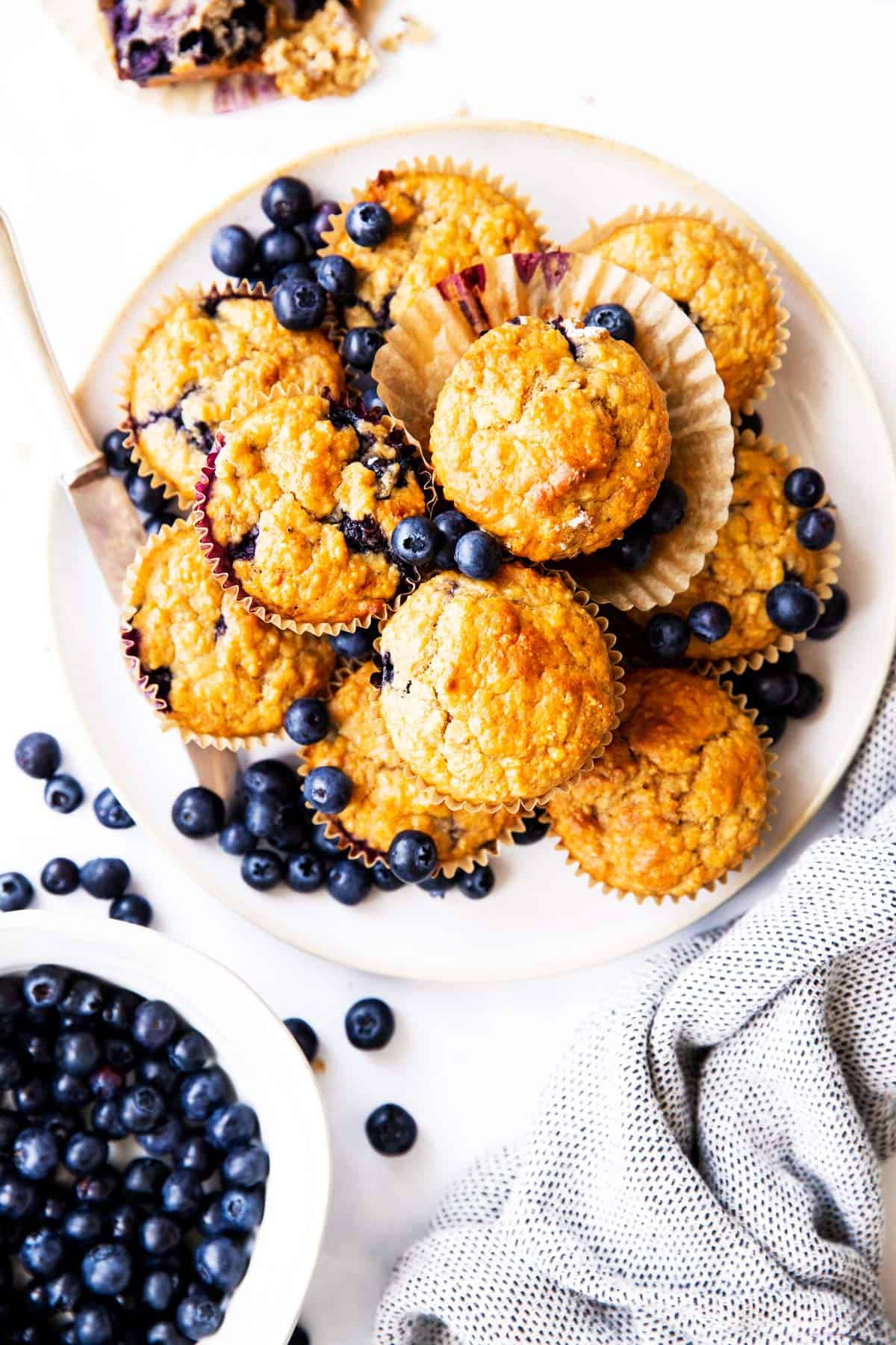 top down view on a plate filled with blueberry muffins