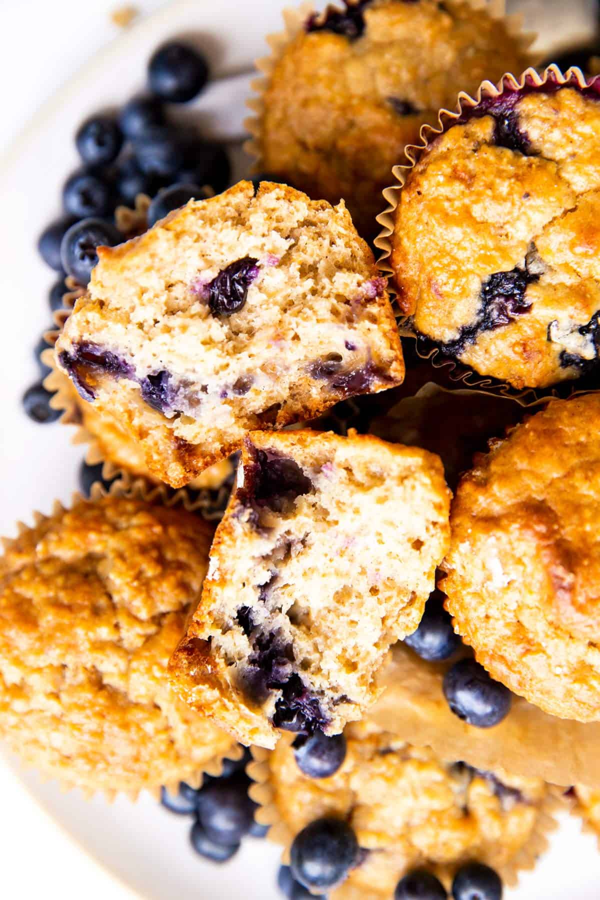 top down view on pile of muffins with one broken in half