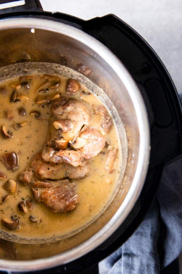 instant pot with pork chops and mushroom sauce