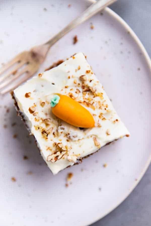 slice of carrot cake on a white plate