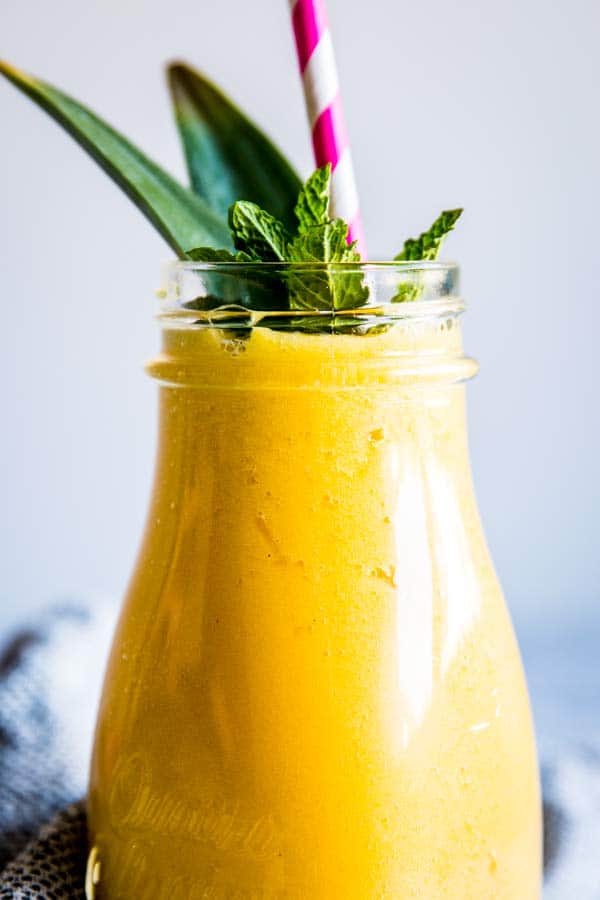 close up photo of pineapple mango smoothie