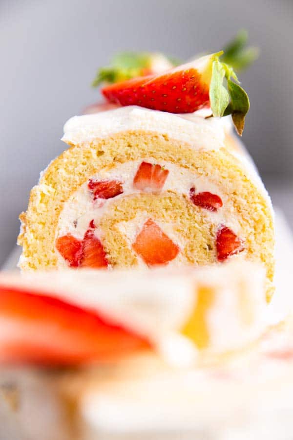 close up photo of strawberry cake roll