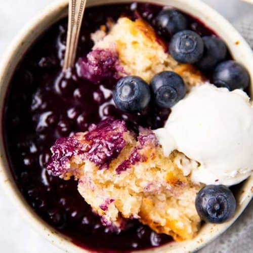 bowl with blueberry cobbler and ice cream