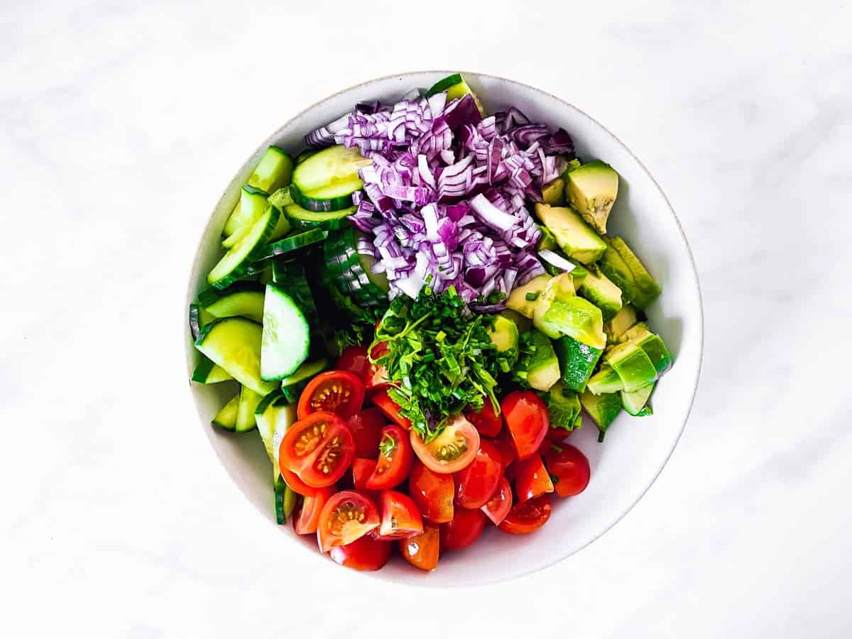 bowl with sliced vegetables