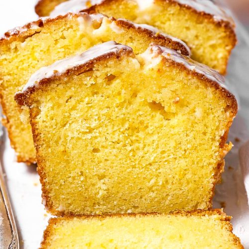 frontal view of sliced lemon loaf cake