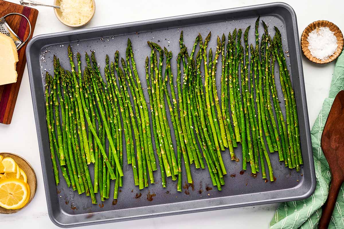 Serving roasted asparagus.