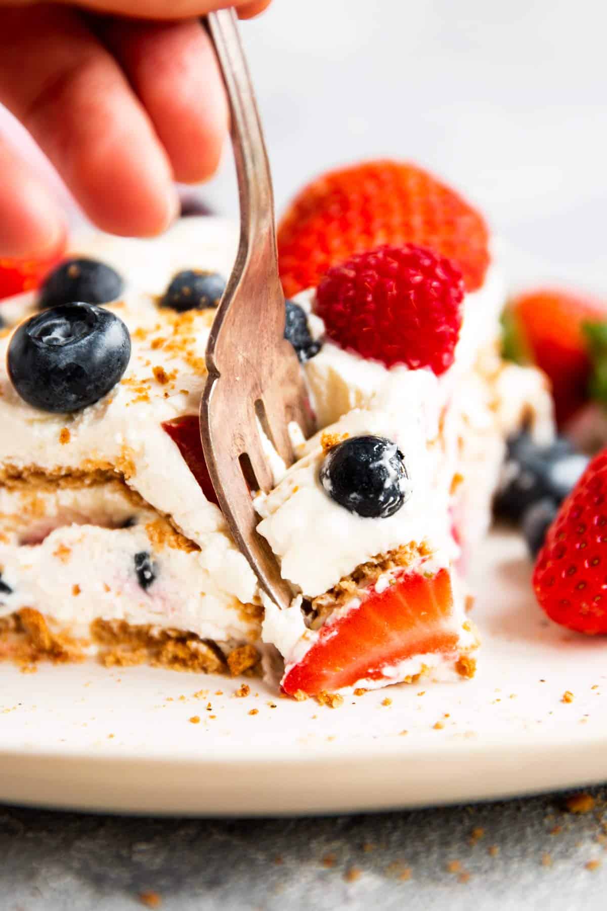 fork digging into a slice of icebox cake