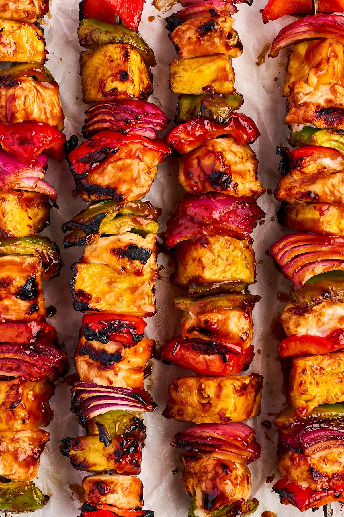 close up of chicken kabobs with pineapple