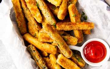 dish with baked parmesan zucchini fries