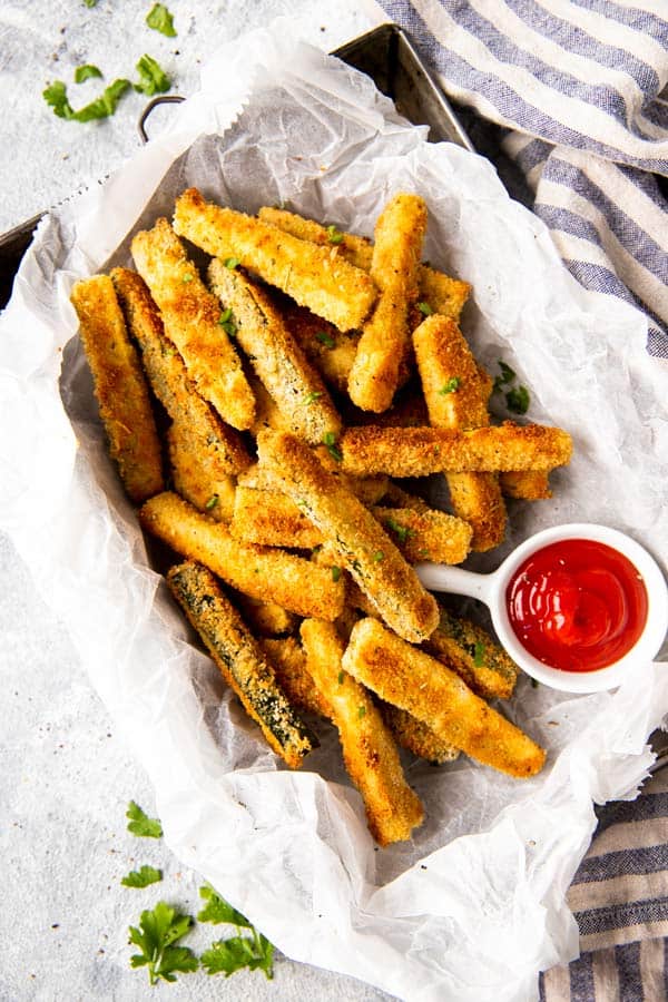 dish with baked parmesan zucchini fries