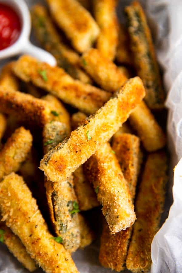 close up of baked parmesan zucchini fries