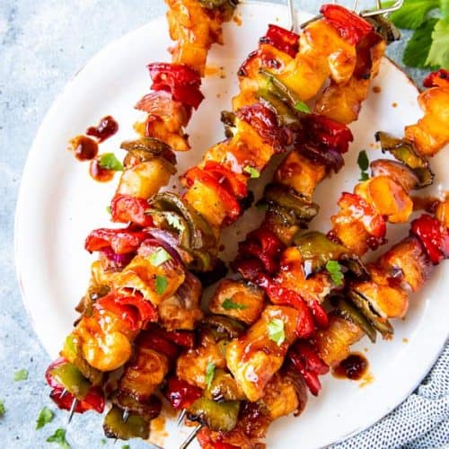 plate with pineapple bbq chicken kabobs