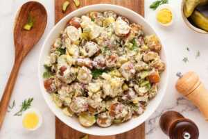 dill pickle potato salad in bowl