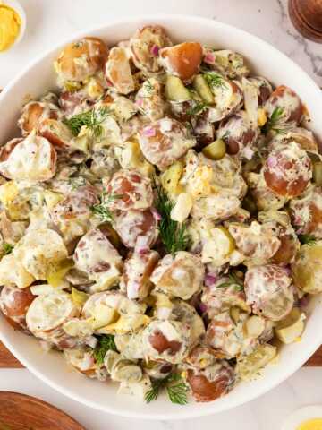 dill pickle potato salad in bowl
