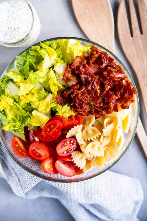 ingredients for blt pasta salad in a bowl