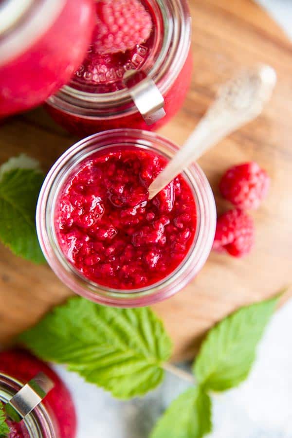 jar with homemade raspberry freezer jam from above