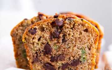 slice of healthy chocolate chip zucchini bread on a chopping board