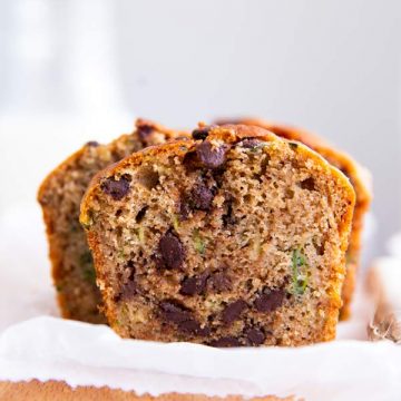 slice of healthy chocolate chip zucchini bread on a chopping board