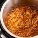 instant pot with honey bbq pulled pork inside