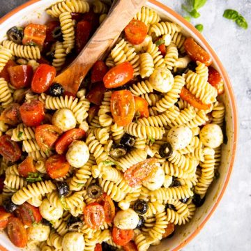 large bowl with pesto pasta salad