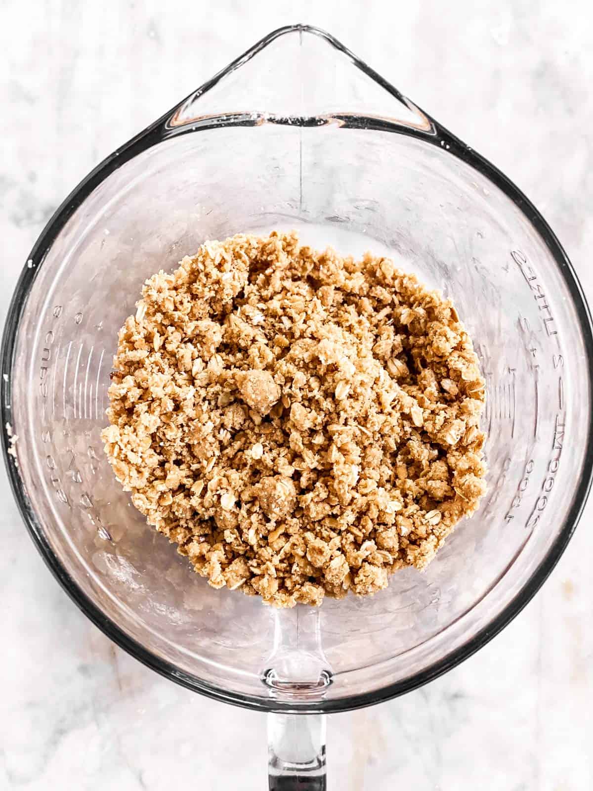 apple crisp topping in a glass bowl