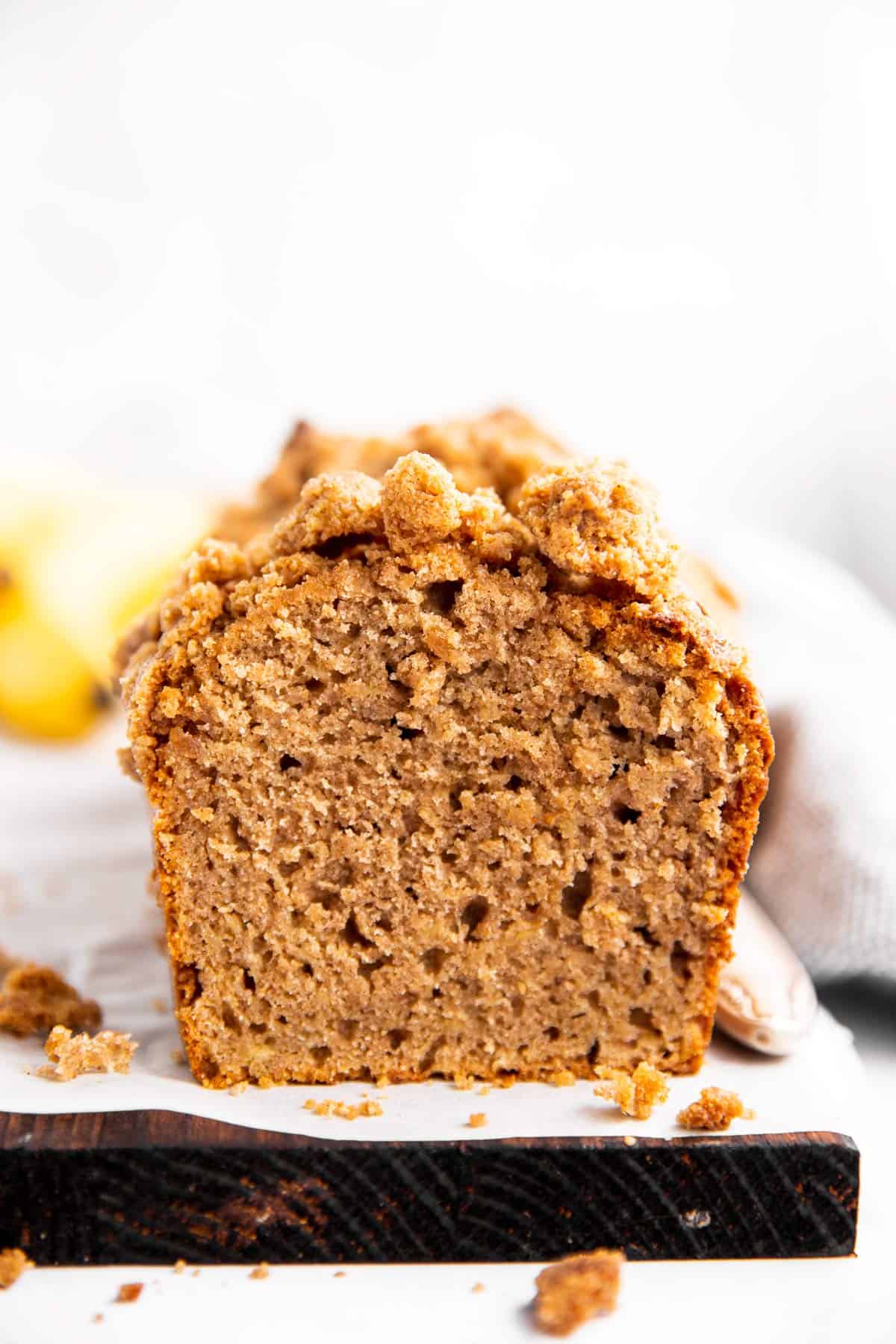 sliced banana bread on a wooden board