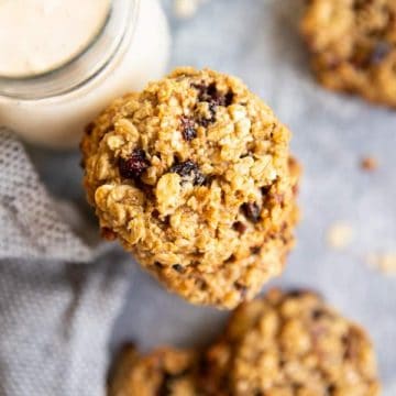 healthy oatmeal breakfast cookies on a table with a glass of milk