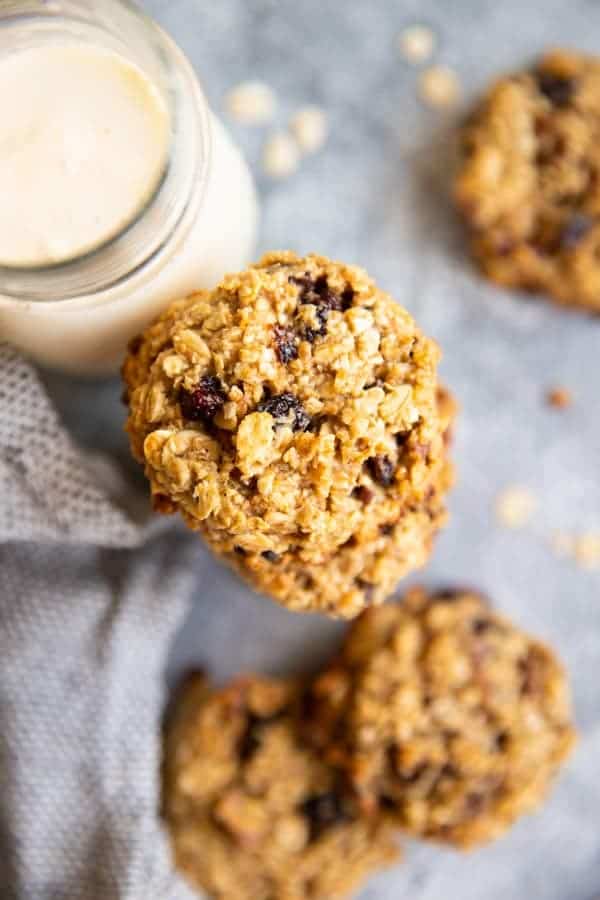healthy oatmeal breakfast cookies on a table with a glass of milk