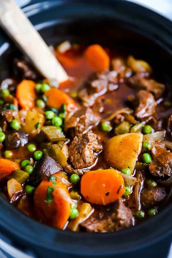 close up photo of beef stew in a crock pot