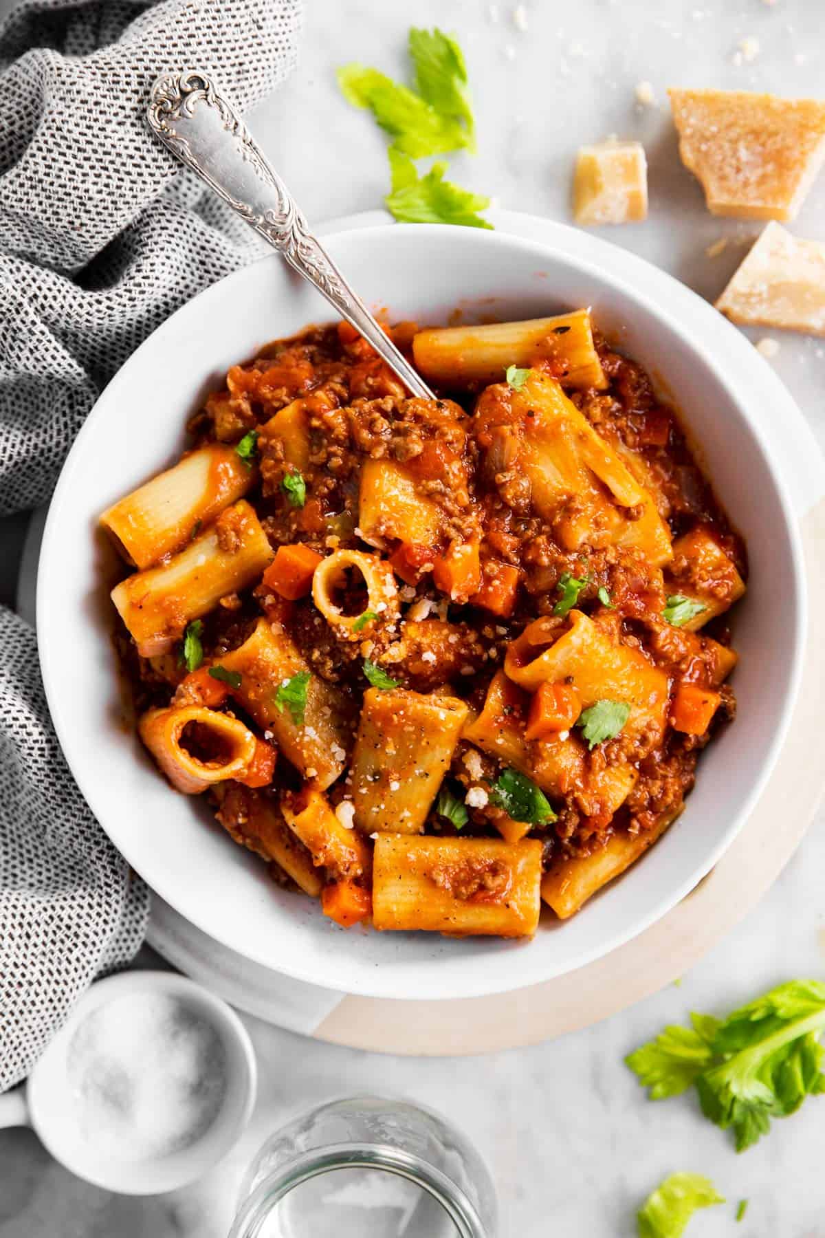 white bowl with rigatoni bolognese