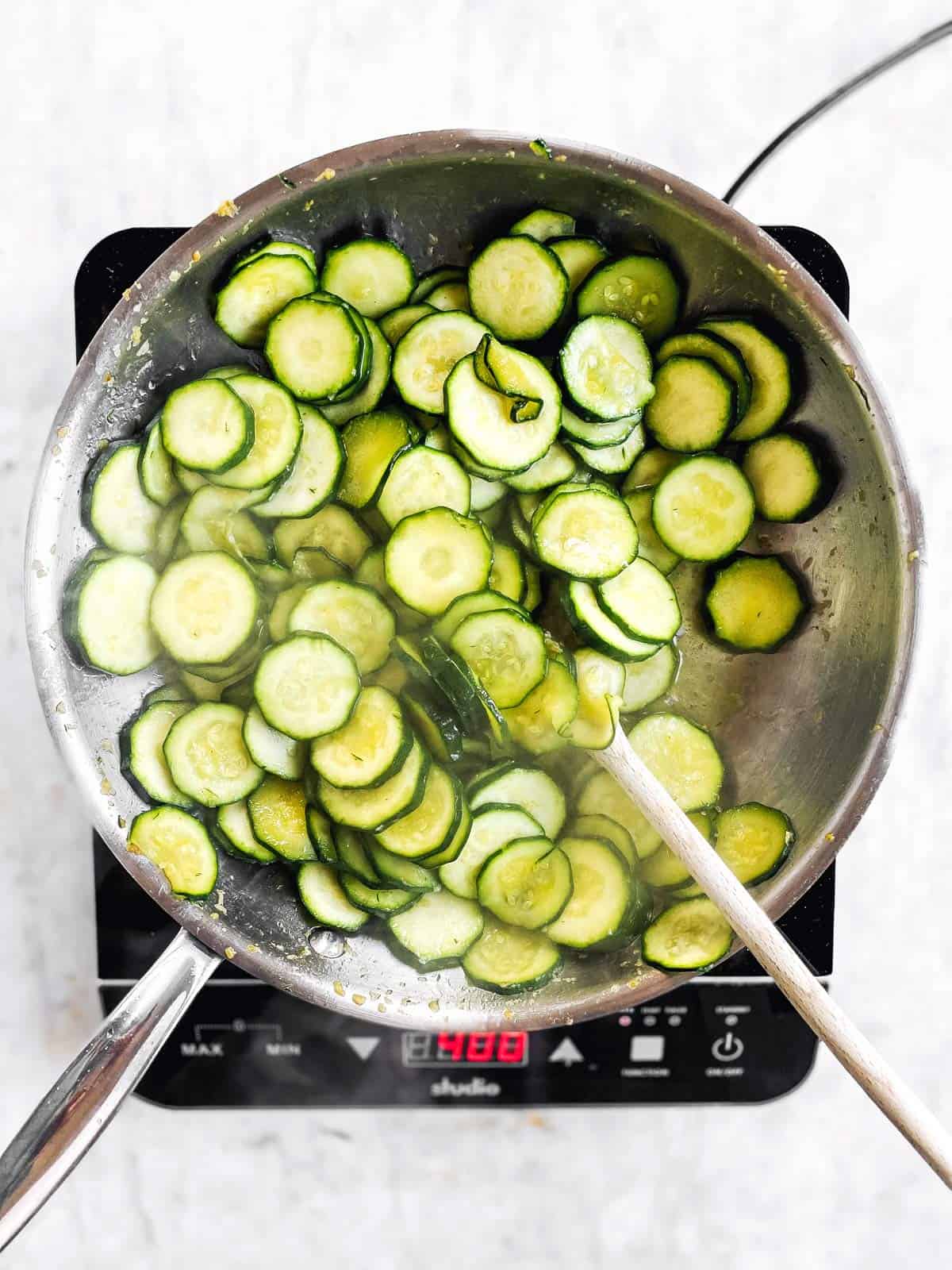 overhead view of zucchini slices in skillet