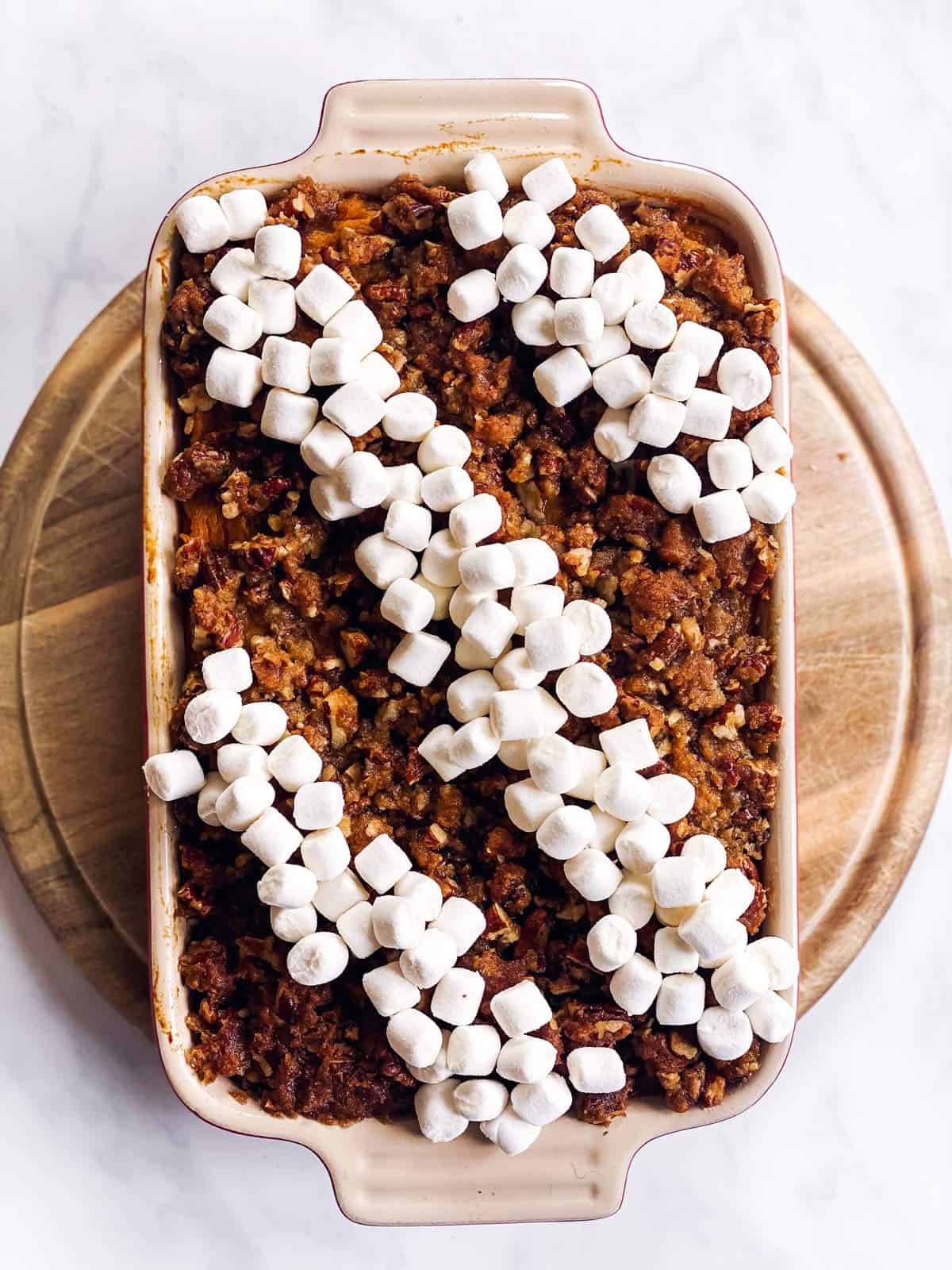 sweet potato casserole with unbaked marshmallows on top