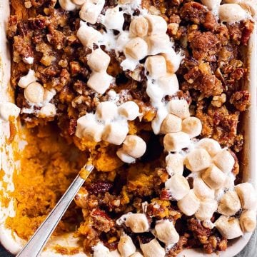 close up photo of spoon in sweet potato casserole