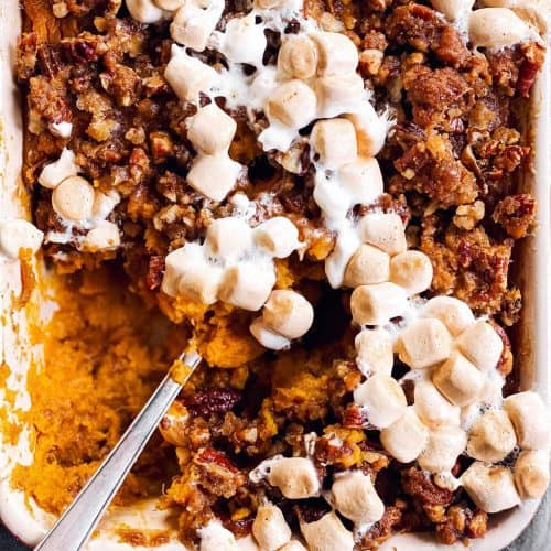 close up photo of spoon in sweet potato casserole