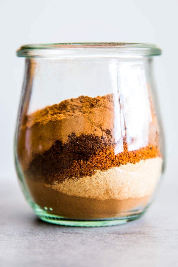 glass jar with spices for pumpkin pie mix