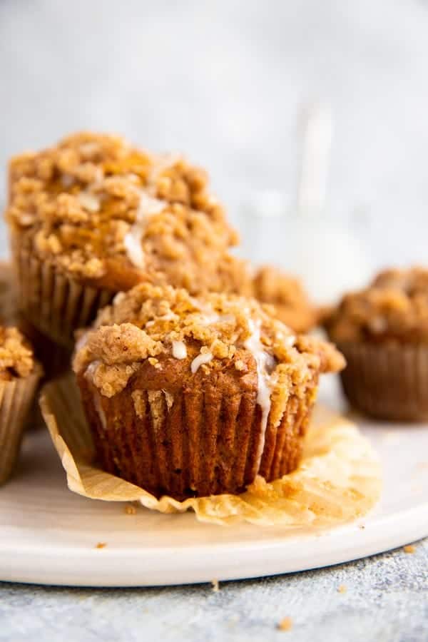 pumpkin crumb muffins on a serving platter