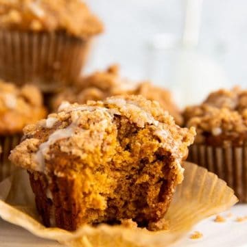 pumpkin crumb muffin with a bite taken out