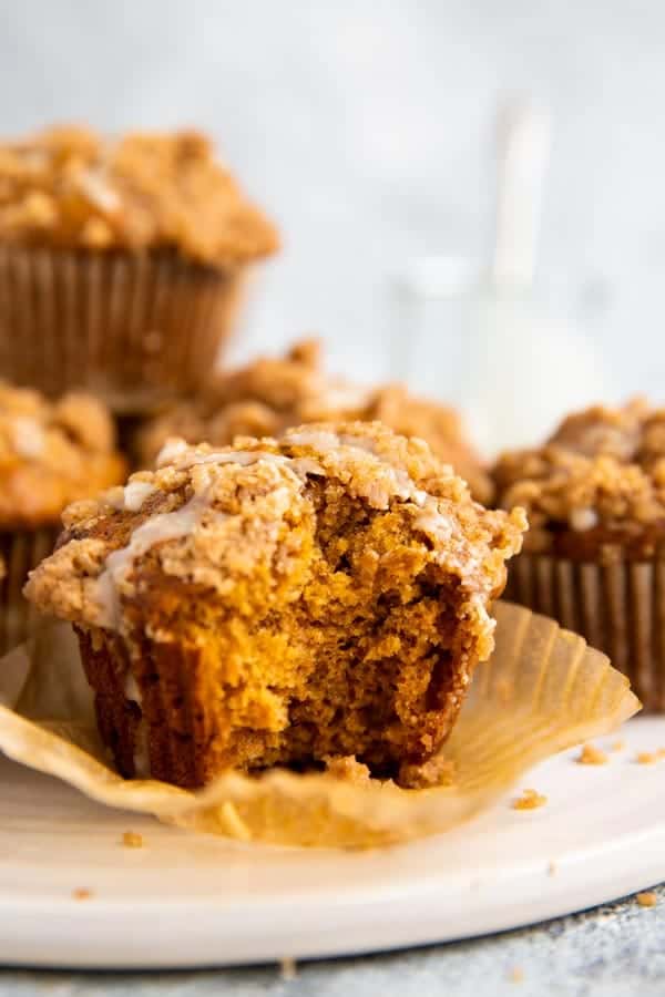 pumpkin crumb muffin with a bite taken out