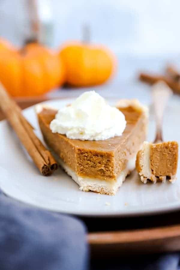 close up photo of a slice of pumpkin pie