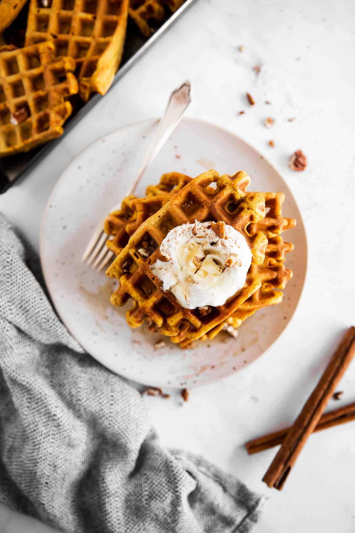 overhead view on plate with pumpkin waffles