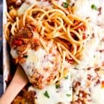 close up photo of a scoop of spaghetti casserole in the dish