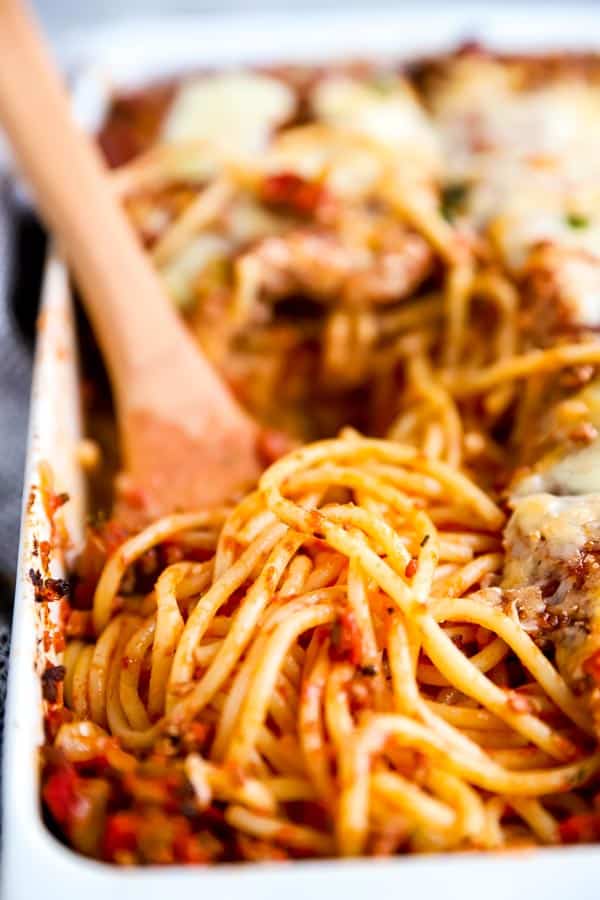 close up photo of spaghetti in a baking dish