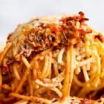 slice of spaghetti bake scooped out of casserole dish